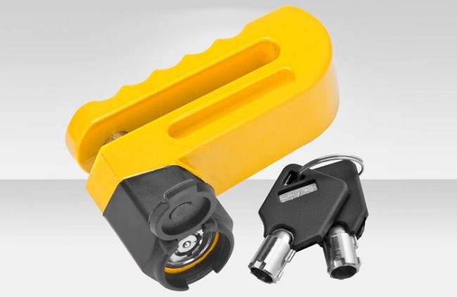Замок на дисковый тормоз Stels 83217 желтый